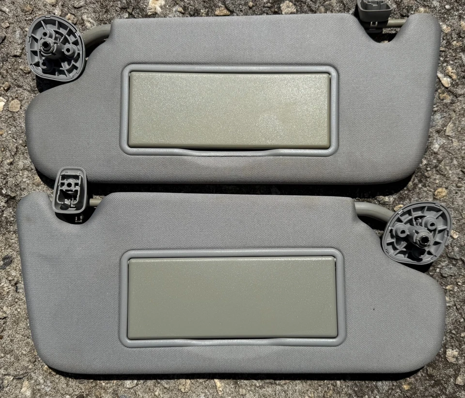 Parasoles grises para conductor pasajero Chevrolet Impala 2006-16 izquierda derecha OEM Foto 1 de 3