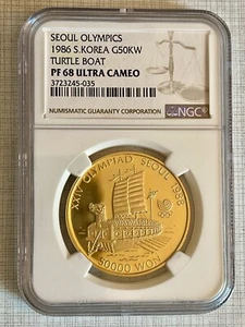 South Korea 1986 50KW Olympics - Turtle Boat Gold Coin NGC PF68 UC Sku# 4862 - Picture 1 of 2