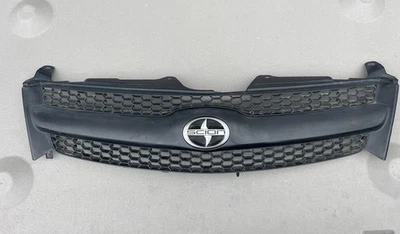 Parrilla de plástico negra Scion xA Base 2006 panal frontal OEM Foto 1 de 4