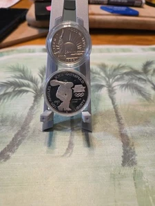 1983 Los Angeles XXlll Olympiad Coin . Includes One Dollar Silver Coin And Clad - Picture 1 of 4