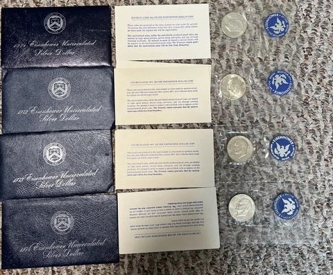 Lot of 4 - 1971 S to 1974 S Eisenhower 40% Silver Ike Dollars Cover