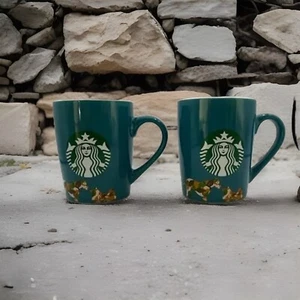 Juego de 2 tazas de café Starbucks verde azulado con perros florales 2020 10 fl oz camuflaje - Imagen 1 de 6