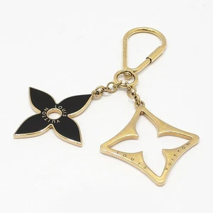 Louis Vuitton Puzzle Flower Bag Charm Keyring 66184 146926469 - Picture 1 of 6
