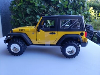 1/ 18 Diecast 2014 Jeep Wrangler In Yellow Customized Offroad Tires And Chrome  - Image 1 of 4