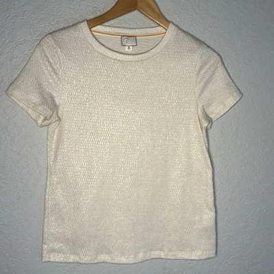 Top Anthropologie estampado postal brillo metálico textura neutra manga corta Foto 1 de 4