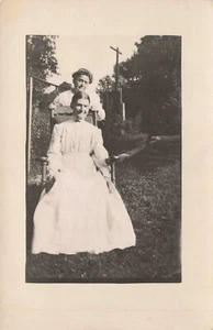 Mother & Daughter(?) Posing in Yard RPPC 100 + Years Old - Picture 1 of 2