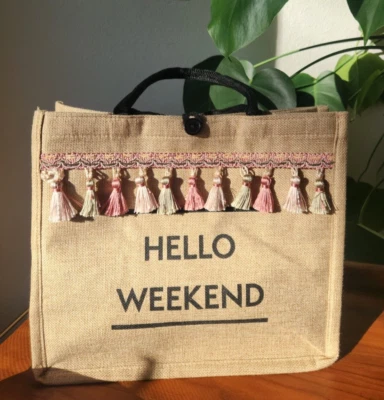 Nuevo bolso de mano con borla de yute Foto 1 de 4