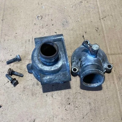 Mercedes-Benz W124 M102 Engine Thermostat Housing 1022030373 - Image 1 of 4