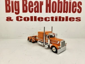 1/64 DCP/FG "Roark" Orange & White 389 Peterbilt 63" Flattop Sleeper Tractor - Picture 1 of 11