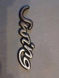 Emblem Opel Corsa B „swing“  90481557 - Bild 1 von 2