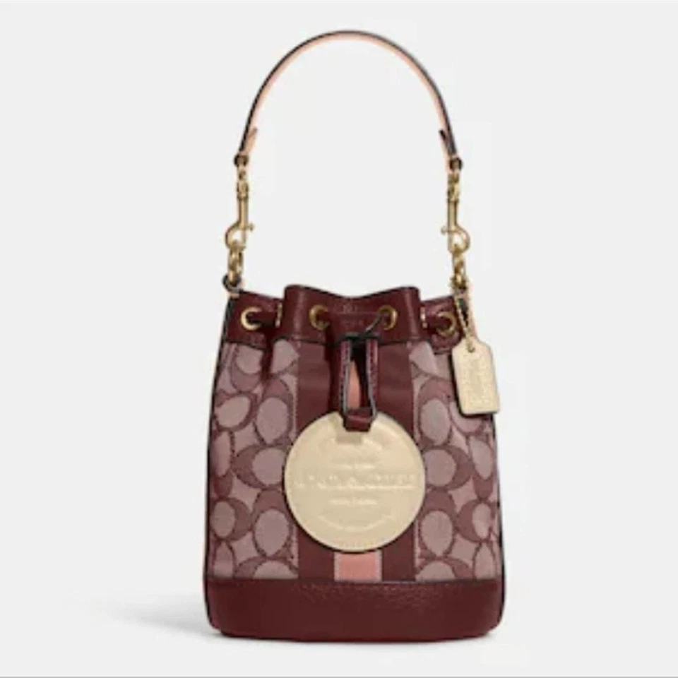 COACH MINI DEMPSEY BUCKET BAG IN SIGNATURE JACQUARD WITH STRIPE & COACH PATCH  - Image 1 of 4