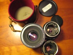 3 Nikkor Nikon F mount lenses -- 50mm and 21mm