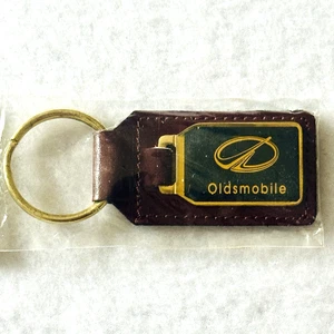 Oldsmobile Schlüsselanhänger massiv Messing 24 Kt vergoldet Oldtimer Auto Logo neu versiegelt neu aus altem Lagerbestand - Bild 1 von 14