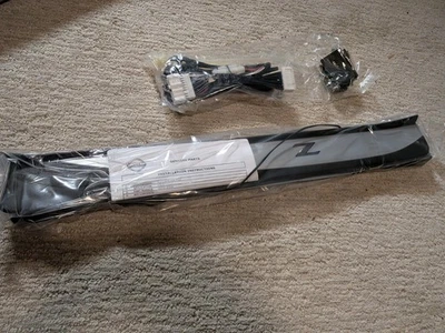 Nissan 370Z 2009-2020 OEM nuevo iluminado logotipo Z placas de patada parte G6950-1EA0A Foto 1 de 3