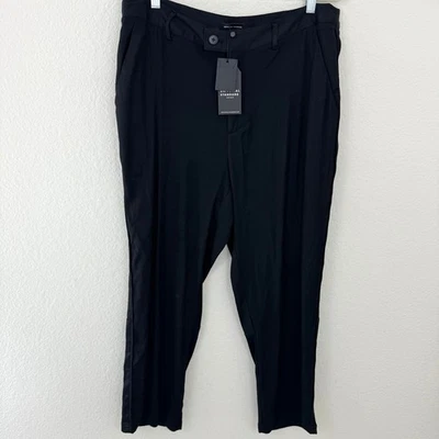 Pantalones de trabajo de viscosa fluidos universales estándar para mujer negros talla XS (10-12) Foto 1 de 4