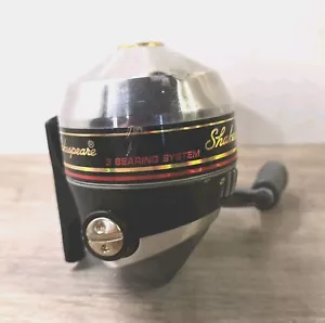 Shakespeare ULT10 Cast Spin Casting Fishing Reel Vintage Black/Silver Spooled - Picture 1 of 9