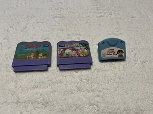 Lot 2 VTech V.smile Game Cartridges Scooby-Doo & Alphabet Park + Leap Frog Baby - Picture 1 of 4