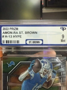 Panini Prizm 2022 - Hype Amon-Ra St. Brown #H-13 Silver Prizm clasificación 9 por PP - Imagen 1 de 6