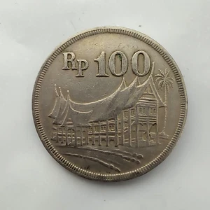 ๐ฎ๐ฉ Indonesia 100 rupiah Minangkabau 1973 Coppernickel . E185 - Picture 1 of 3