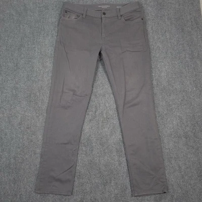 Pantalones de mezclilla Banana Republic Traveler para hombre 33x32 gris humo calce ajustado elásticos Foto 1 de 4