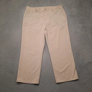 Pantalones de golf Under Armour para hombre talla 40 caqui tostado calce suelto rendimiento chino 40x26 - Imagen 1 de 9