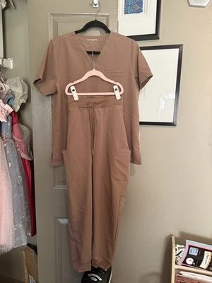 Bonitos exfoliantes de mandala marrón talla grande Foto 1 de 4