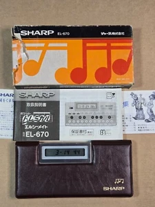 Calcolatrice musicale Sharp EL-670 Melody come nuova in scatola con manuale funzionante bene - Foto 1 di 4