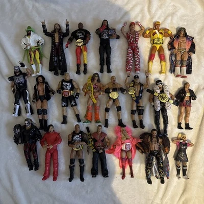 WWE Elite Ultimate Edition Lot 22 Figures And Parts Sold As Seen - Image 1 of 4