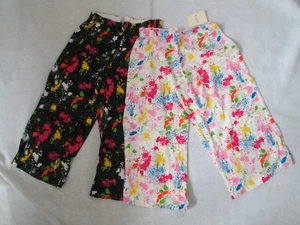 Menge 2 Junior Mädchen Caprihosen Small Medium Large NEU weiß/schwarz Splash - Bild 1 von 1