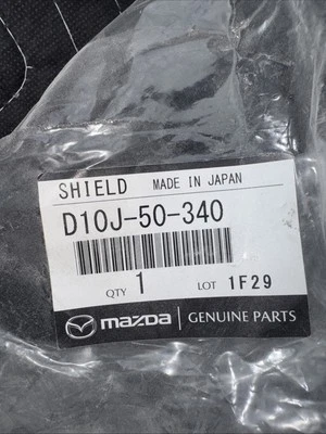 Protector contra salpicaduras parachoques derecho utilitario deportivo Mazda CX-3 2016-2021 OEM NUEVO D10J-50340 Foto 1 de 2