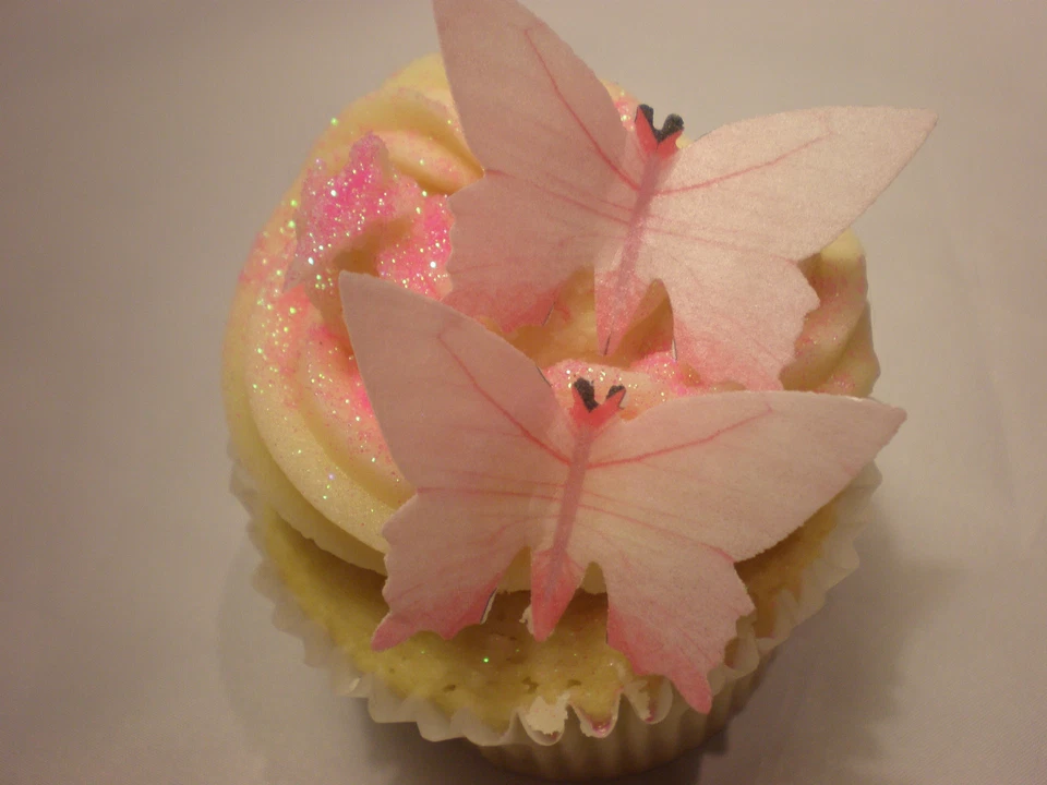 25 adornos para pasteles de mariposa de papel comestible rosa pálido PRECORTADO Foto 1 de 1
