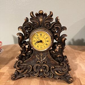 ROMINENCE CLOCK ORNATE BRONZE COLORED RESIN BATTERY OPERATED MANTEL CLOCK