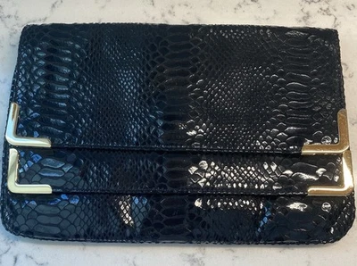 ¡NUEVO SIN ETIQUETAS! Bolso clutch Michael Kors de cuero pitón con detalles dorados aberturas dobles 11"x7" Foto 1 de 4