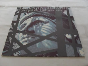 JACKSON BROWNE - LIVES IN THE BALANCE ORIG 1986 GERMAN ASYLUM ALSDORF PRESS LP - Picture 1 of 7
