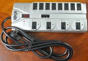 TRIPP LITE Power Strip TLP1208TEL Surge Protector 12 Outlets 3 Phone Line - Picture 1 of 1