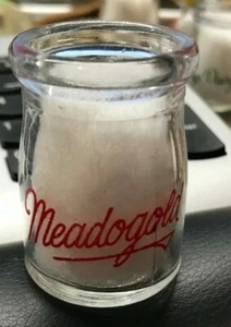 VINTAGE MEADOGOLD DAIRY ROUND GLASS MILK CREAMER 1 7/8" RED PYRO 2 SIDED - Picture 1 of 2