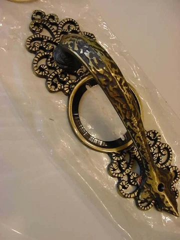 NEW BRASS ESCUTCHEON DOOR PULL, BRASS IS ANTIQUE FINISHED , BY TRIMCO Cover