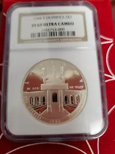1984-S Los Angeles OLYMPICS š1 Oz Proof Dollar Ultra Cameo Silver Coin NGC PF69 - Picture 1 of 7