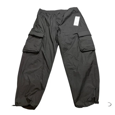 Pantalones cargo Alo para hombre negros Voyage pantalones cargo utilitarios rendimiento elásticos 2XL Foto 1 de 4