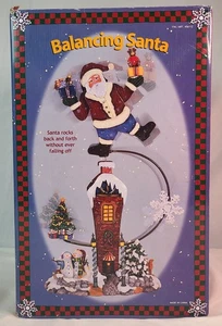 Balancing Santa Rocks Hin und Her Weihnachtsdekoration 20" Neu geöffnete Verpackung  - Bild 1 von 5