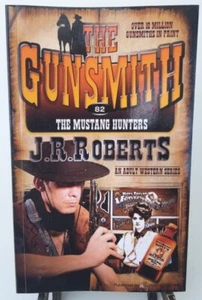 #82 The Mustang Hunters -The Gunsmith By J. R. Roberts (An Adult Western Series) - Foto 1 di 4