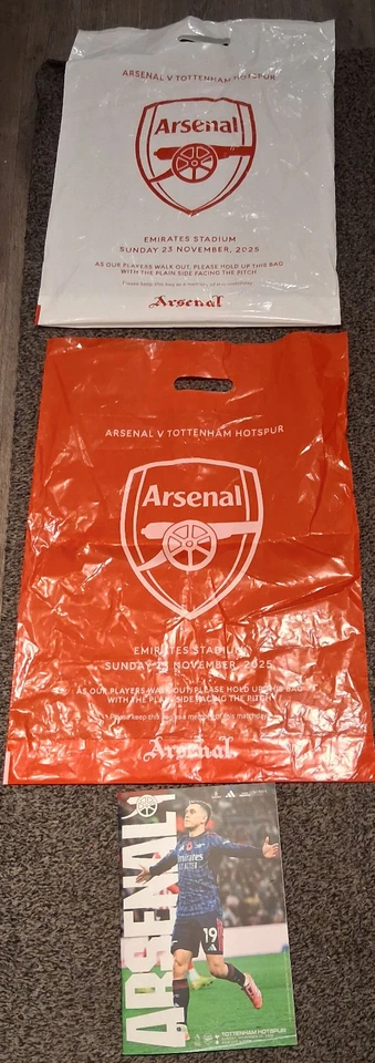 Arsenal v Tottenham Hotspur 23/11/2025 programme + red & white bags - Image 1 of 1