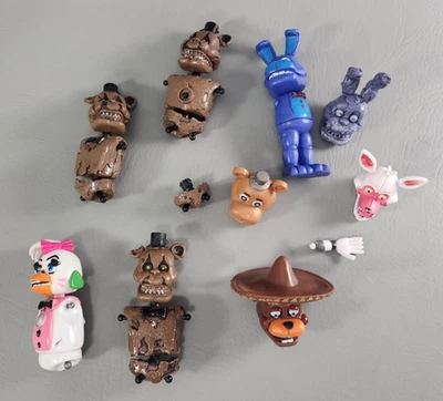 Five Nights at Freddy's Action Figures Misc. Pieces & Parts (11 pieces total) - Image 1 of 4