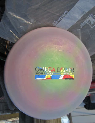 Disco de golf Omega Driver Short Range Driver Approach 1997 1,3 Millennium San Marino Foto 1 de 4