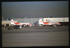 35 mm AIRCRAFT SLIDE N73160 N73163  Frontier Airlines AT DENVER DATED 1983 #4576