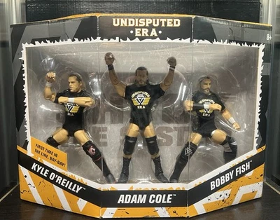 ABIERTO COMPLETO Mattel WWE NXT RSC Exclusivo Juego de Figuras Era Indiscutible Adam Cole Foto 1 de 4