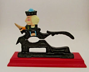 Old Fashioned Painted Heavy Metal Nutcracker on Wooden Stand for Use or Display - Picture 1 of 1