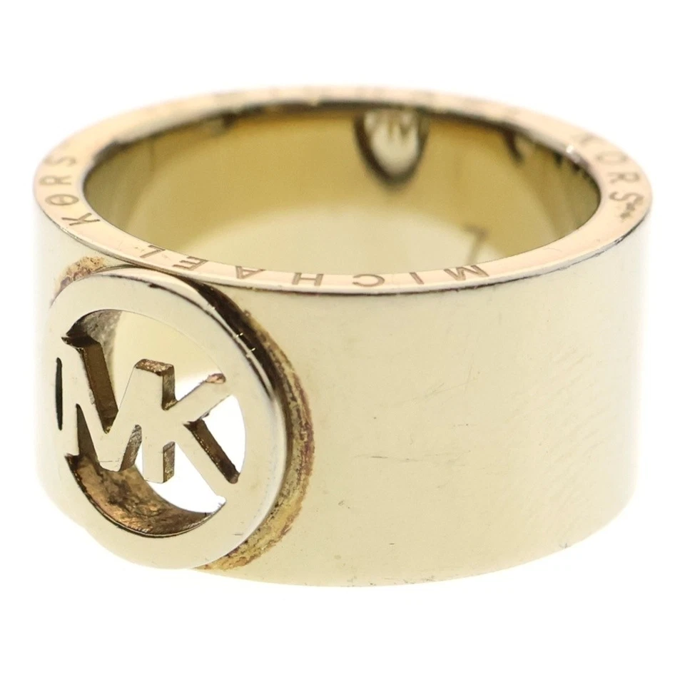 Anillo con logotipo de MICHAEL KORS oro GP #7 usado 32a50abdb0eaf4f0e9368be137c644a8 Foto 1 de 4