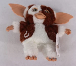 NECA Gremlins Gizmo 6" Smiling Plush Doll 30604 New - Picture 1 of 5