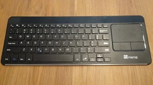 Fintie bluetooth keyboard with touchpad (missing dongle) - Zdjęcie 1 z 3
